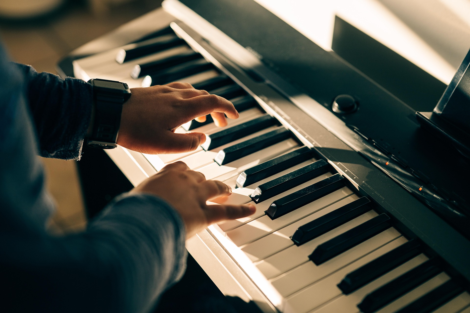 Piano teacher with student